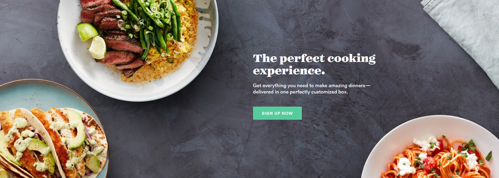 A cover picture like image displaying food dishes from PLATED.