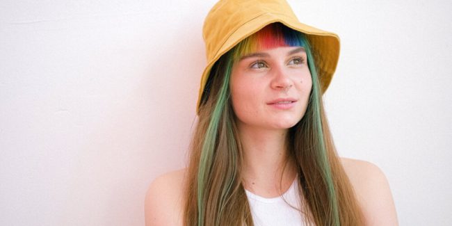 Pic of girl with colorful hair - fake ambassador programs