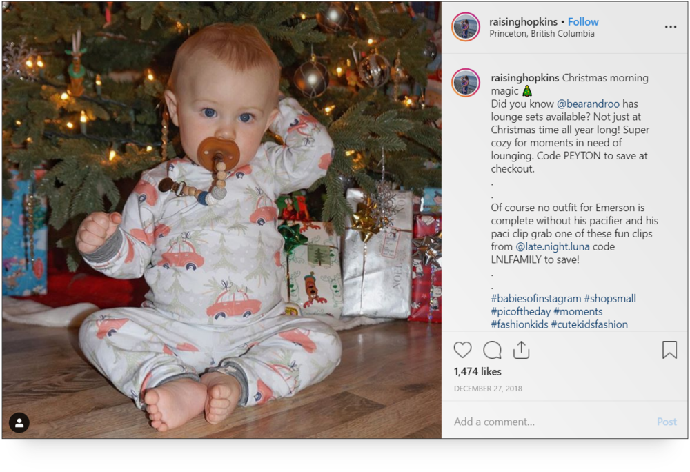 Screenshot of post from @raisinghopkins on Instagram of a baby wearing a pacifier.