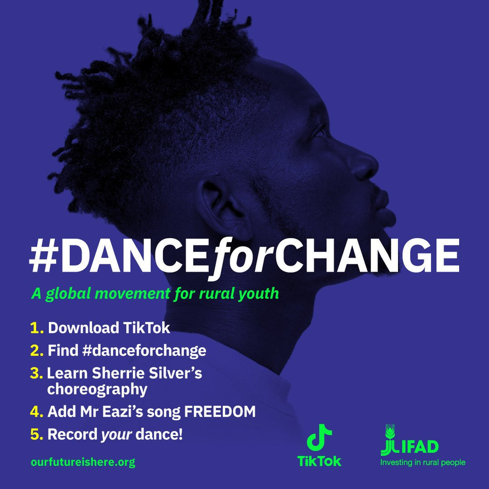 A poster reads "#DANCEforCHANGE" from twitter.