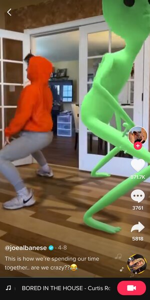Bored in the House Carousel Image 3: @joealbanese dancing with an alien TikTok challenge